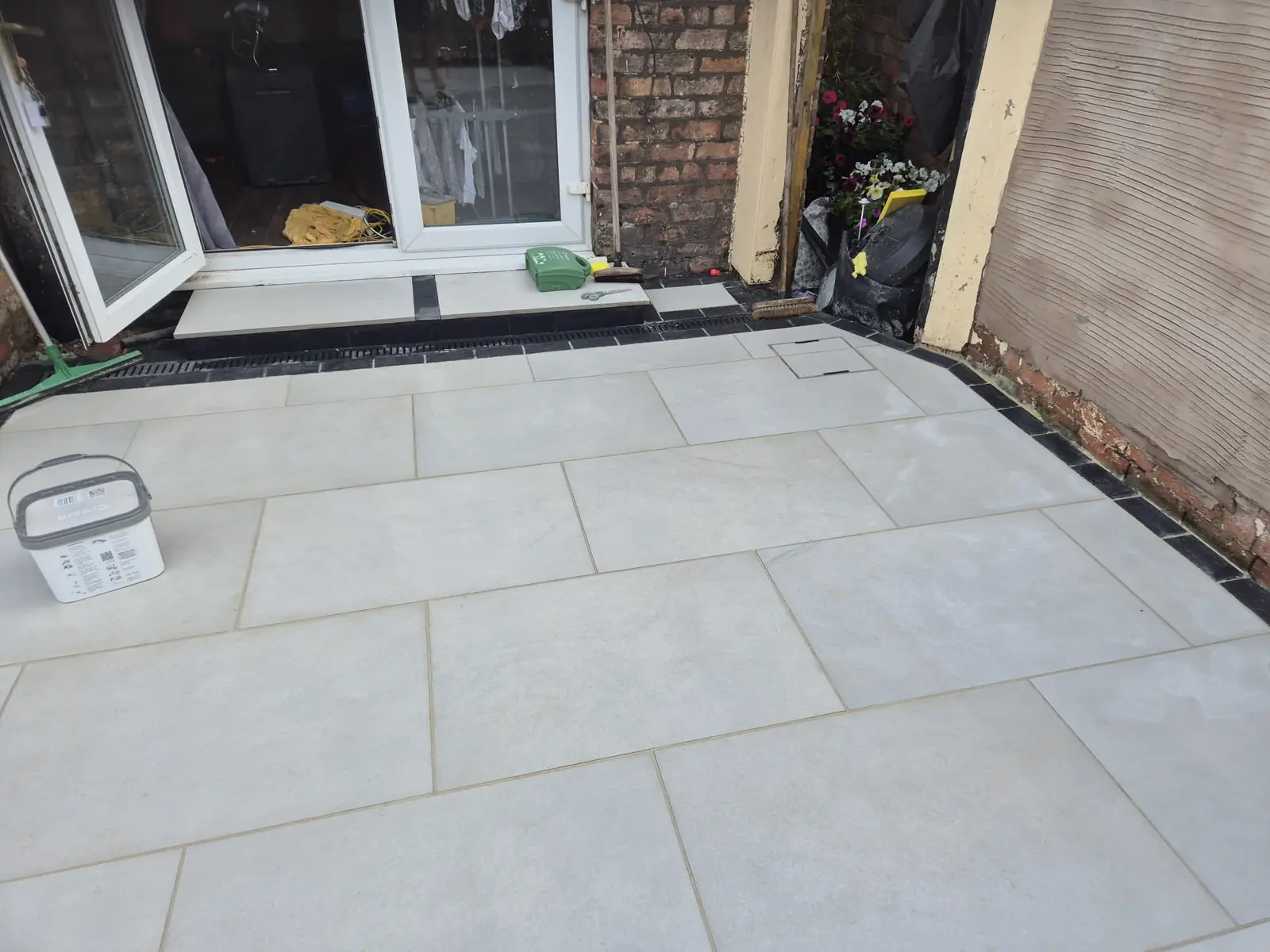 Back door threshold finished with drainage channel and jointing