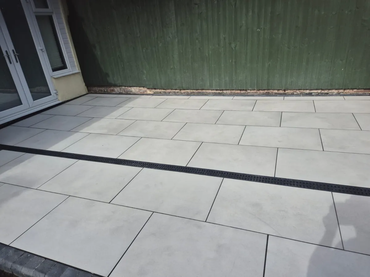 Channel drainage set flush into a finished patio on a Wallasey home